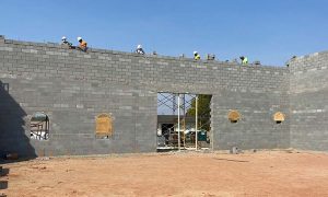 Construction of a block wall building with concrete blocks